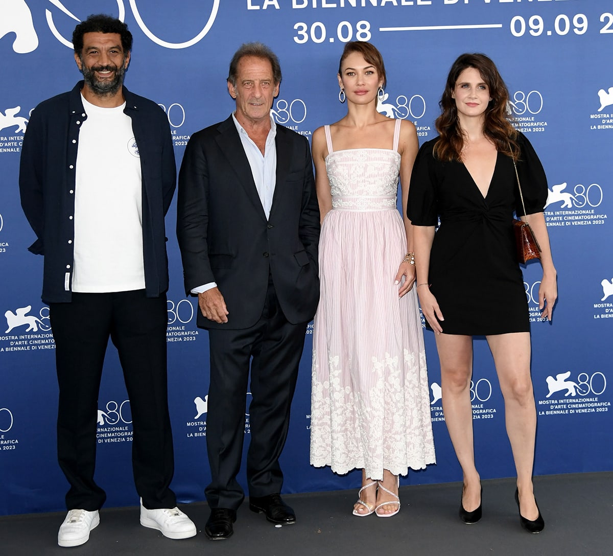 Ramzy Bedia, Vincent Lindon, Olga Kurylenko, and Judith Chemla at the D'Argent Et De Sang 80th Venice International Film Festival photocall on August 31, 2023