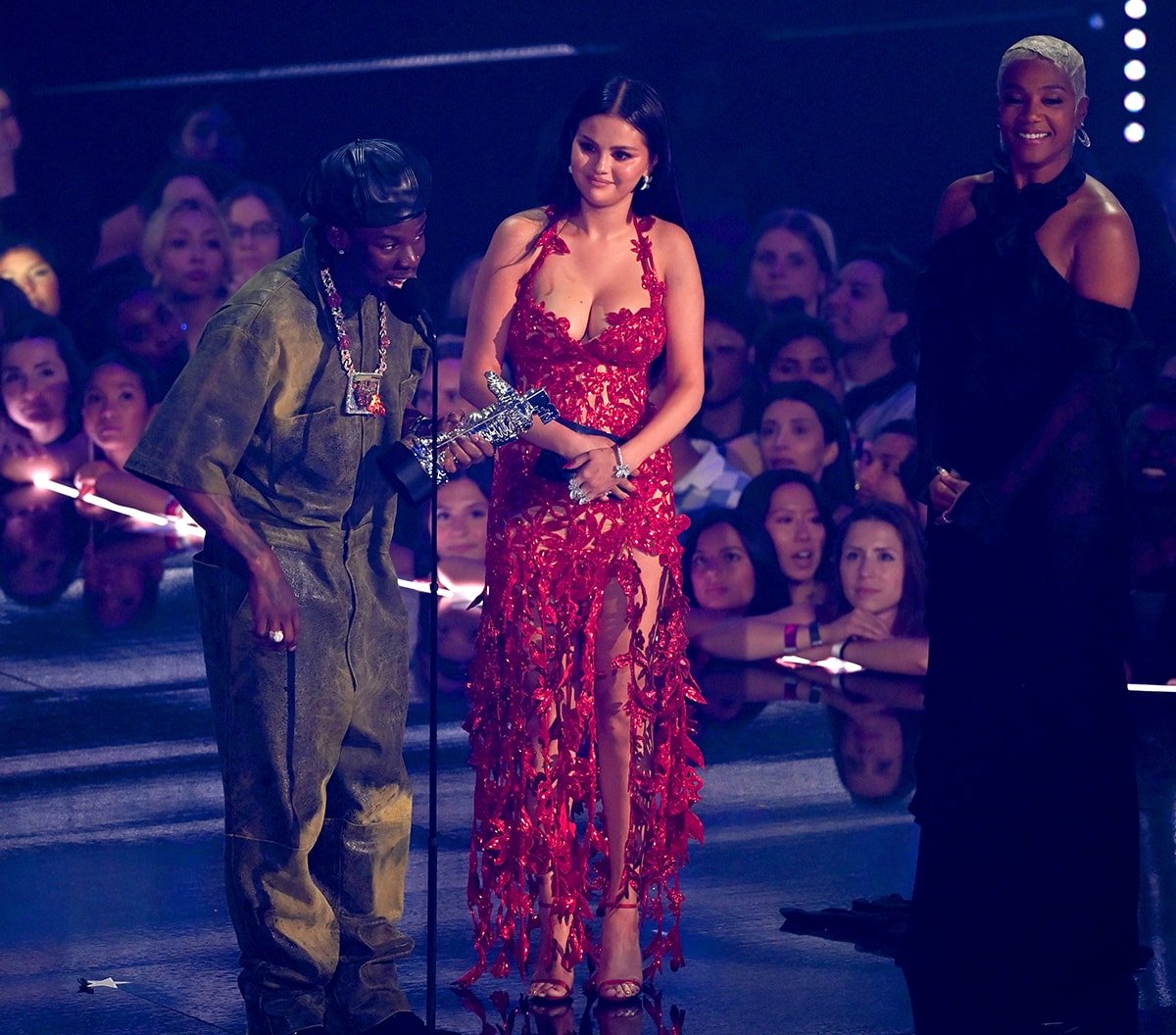 Rema and Selena Gomez take to the stage to receive their Moon Person trophy for Best Afrobeats at the 2023 Video Music Awards on September 12, 2023