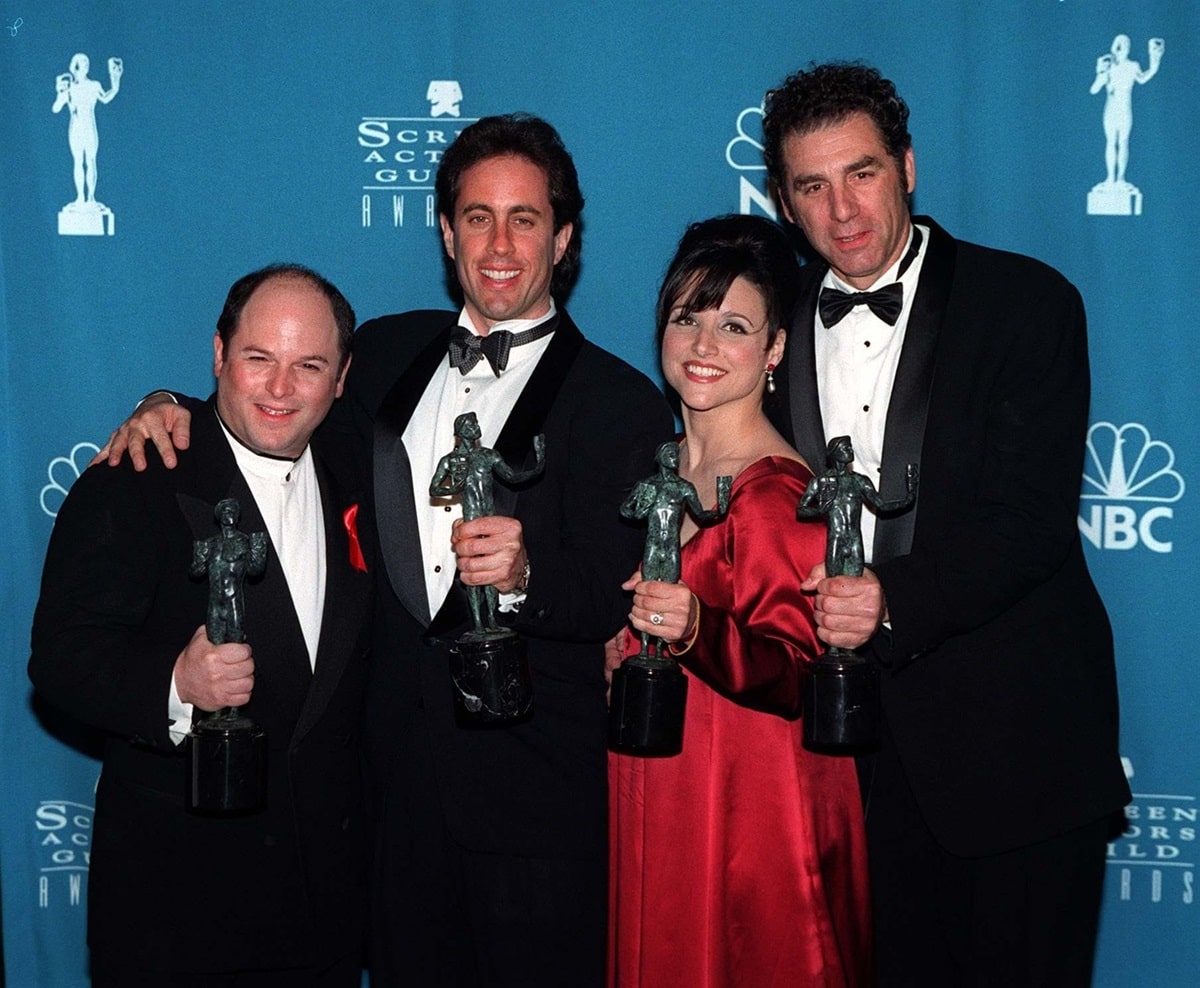 Seinfeld stars Jason Alexander, Jerry Seinfeld, Julia Louis-Dreyfus, and Michael Richards pose with their Screen Actors Guild Award for Outstanding Performance by an Ensemble in a Comedy Series on February 22, 1997