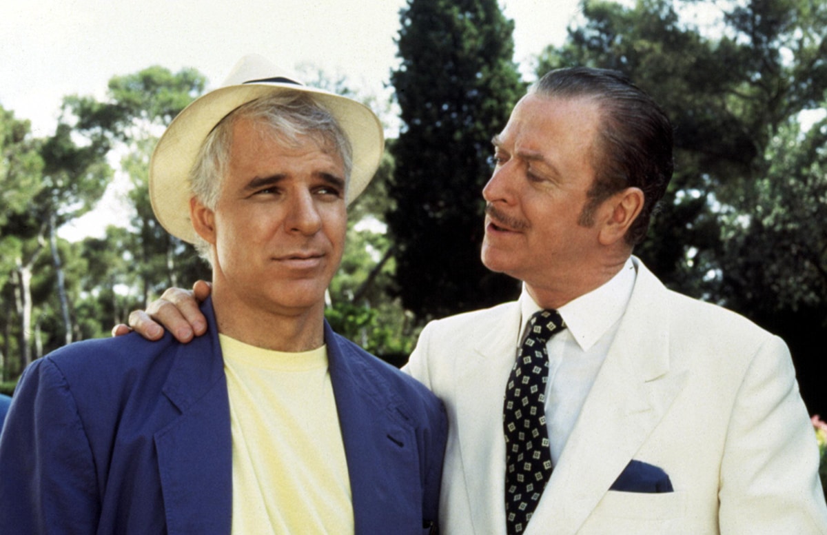 Steve Martin and Michael Caine as con men Freddy Benson and Lawrence Jamieson, respectively, in the 1988 comedy film Dirty Rotten Scoundrels