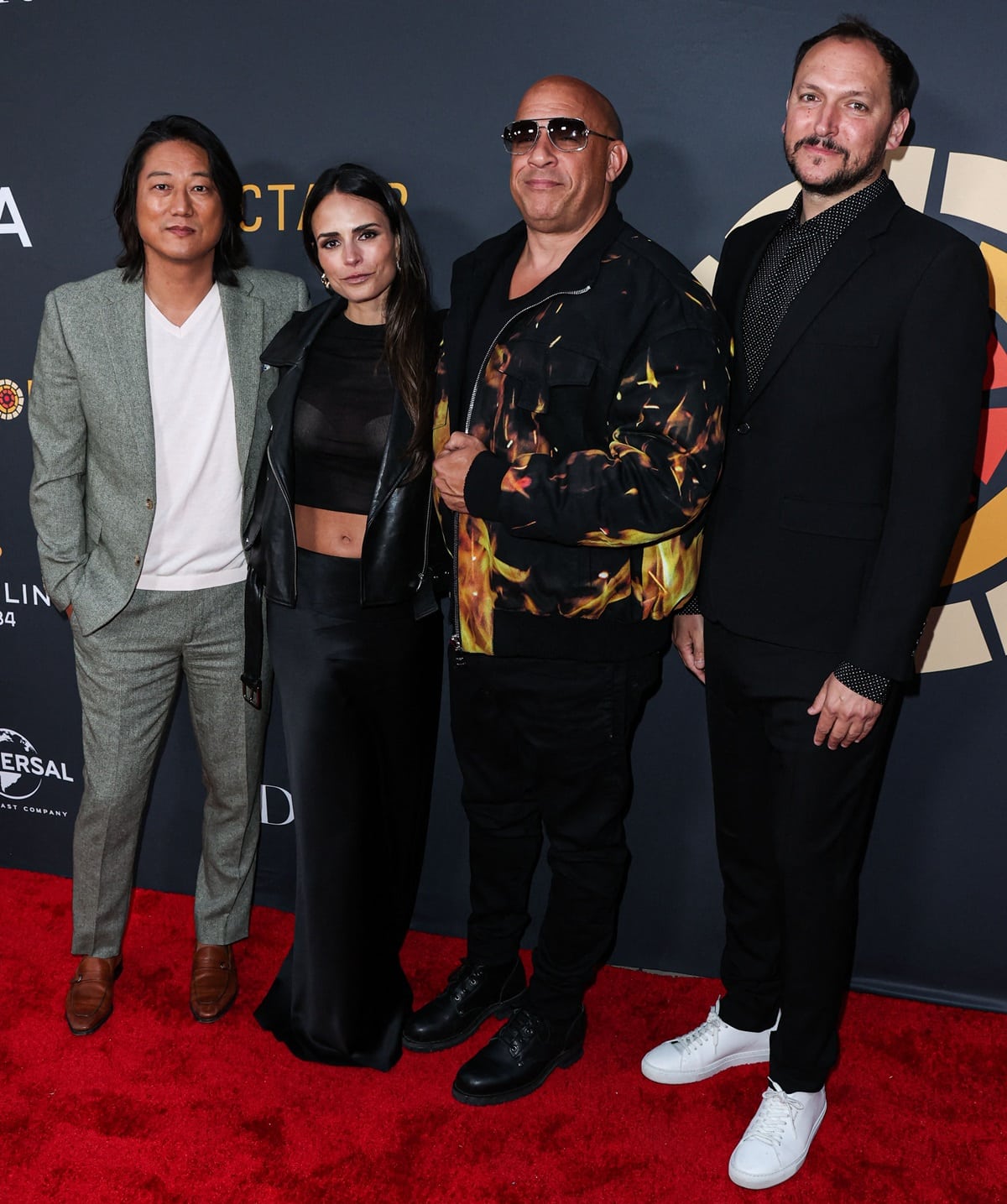 At the Charlize Theron Africa Outreach Project 2023 Block Party on May 20, 2023, in Universal City, California, Sung Kang stood at 6ft 0 (182.9 cm), Jordana Brewster at 5ft 6 ½ (168.9 cm), Vin Diesel at 5ft 11 ½ (181.6 cm), and Louis Leterrier towered at 6′ 4″ (1.93 m)