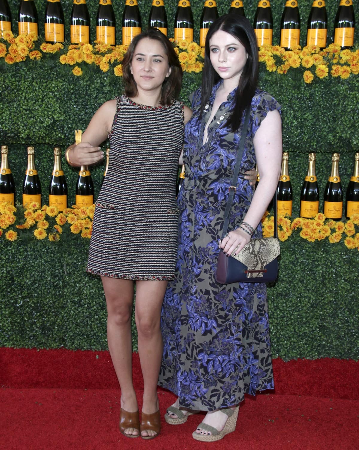 Michelle Trachtenberg, standing at 5ft 6, paired a flowing floral maxi dress with nude wedge sandals, while Zelda Williams, at 5ft 3, opted for a chic tweed mini dress and brown open-toe heels at the sixth-annual Veuve Clicquot Polo Classic at Will Rogers State Historic Park in Pacific Palisades, California, on October 17, 2015
