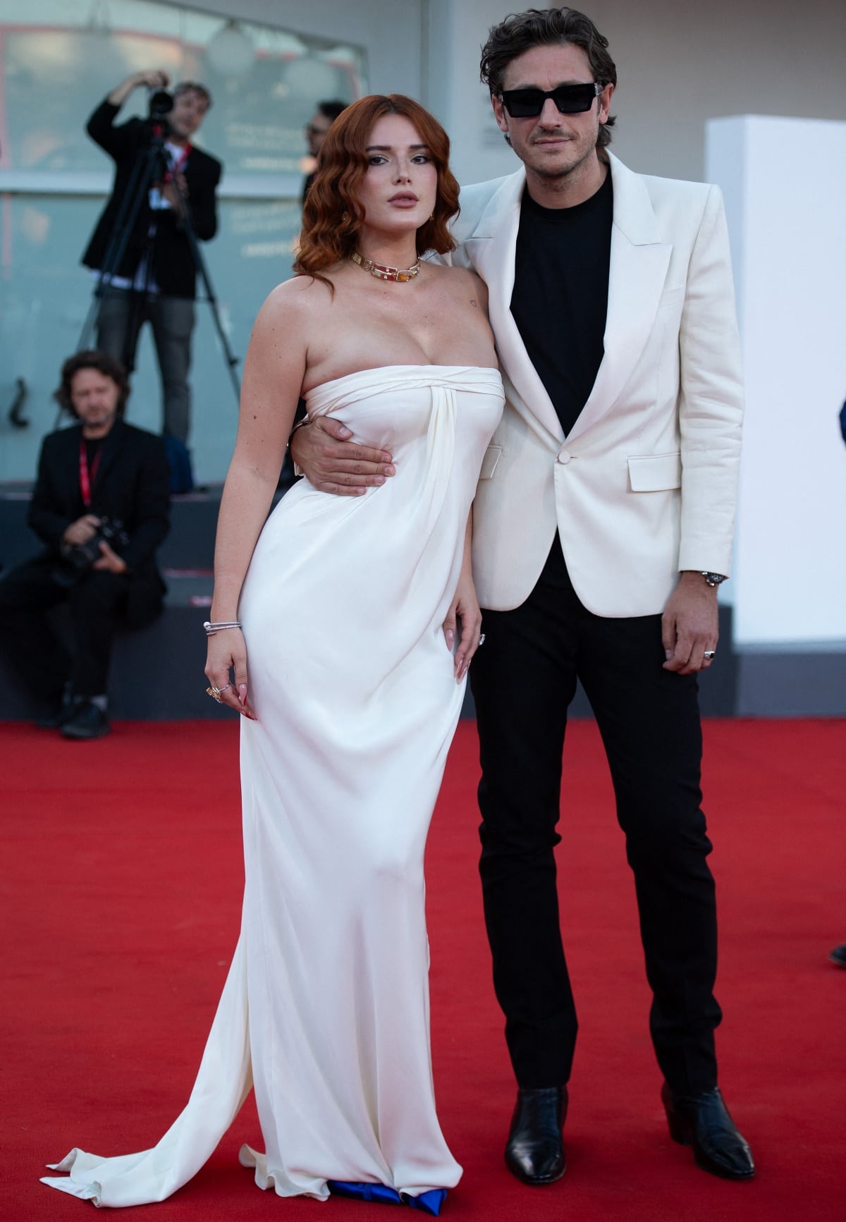 Forming a stylish power couple, Bella Thorne and Mark Emms proudly displayed their affection for each other at the premiere of Priscilla during the 80th Venice International Film Festival