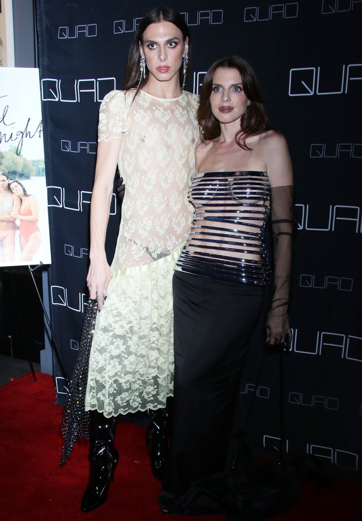 Carmen Madonia towering over Julia Fox as they posed for photographs together on the red carpet