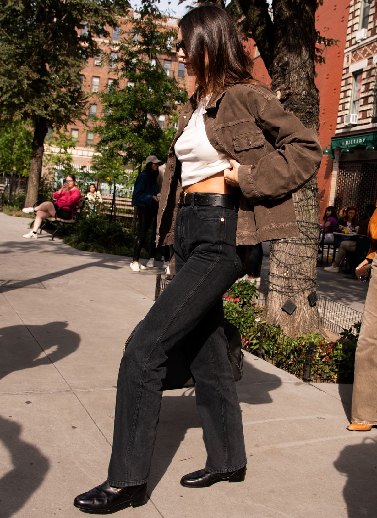 Kendall Jenner elevating her model-off-duty look with a chocolate brown denim jacket and a pair of loafers from The Row