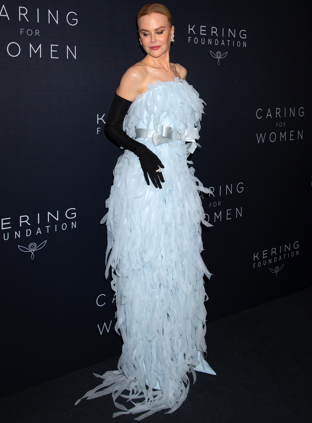 Nicole Kidman wearing black opera gloves and pale blue Balenciaga boots for added drama to her look