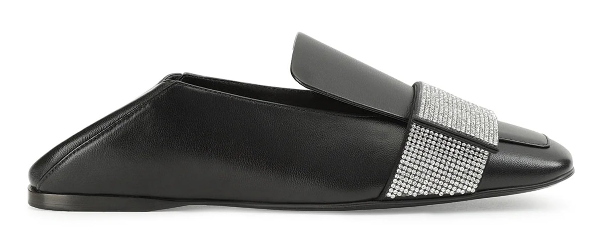 The minimalist square-toe silhouette is beautifully accentuated by a panel adorned with sparkling rhinestones