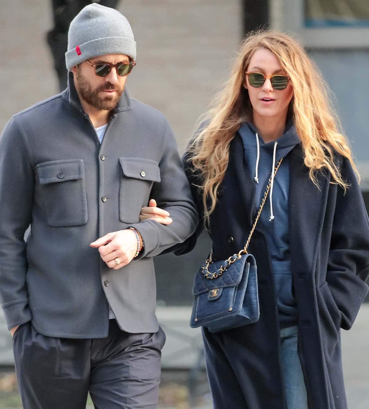 Blake Lively enhances her laid-back ensemble with a Chanel Square Flap bag in denim, featuring aged gold hardware from the 23S collection, stylishly worn across her body
