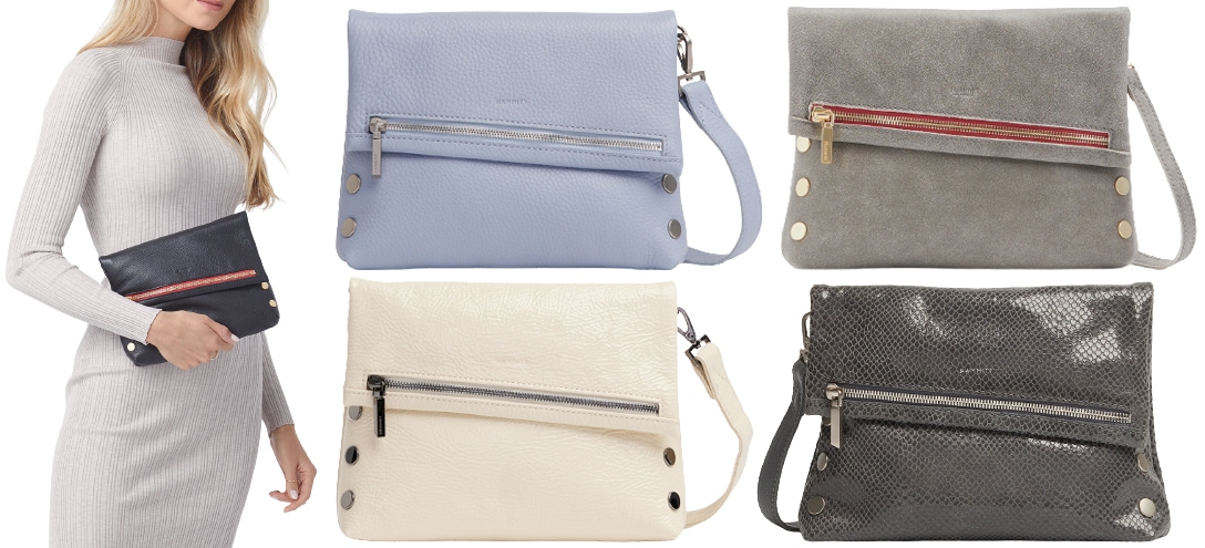Hammitt's VIP MED clutch features an optional strap, subtle embossed rivets, and an exterior phone pocket for easy organization