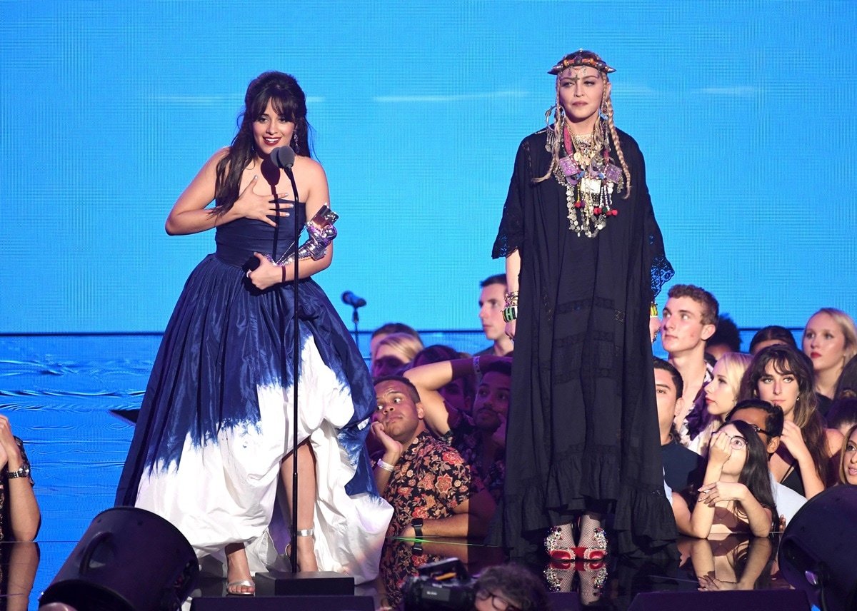 During the 2018 MTV Video Music Awards at Radio City Music Hall in New York City on August 20, Madonna, with a peak height of 5ft 4 inches (162.6 cm) but standing at 5ft 3 ¼ inches (160.7 cm), presented an award to Camila Cabello, who stands at 5ft 2 inches (157.5 cm)
