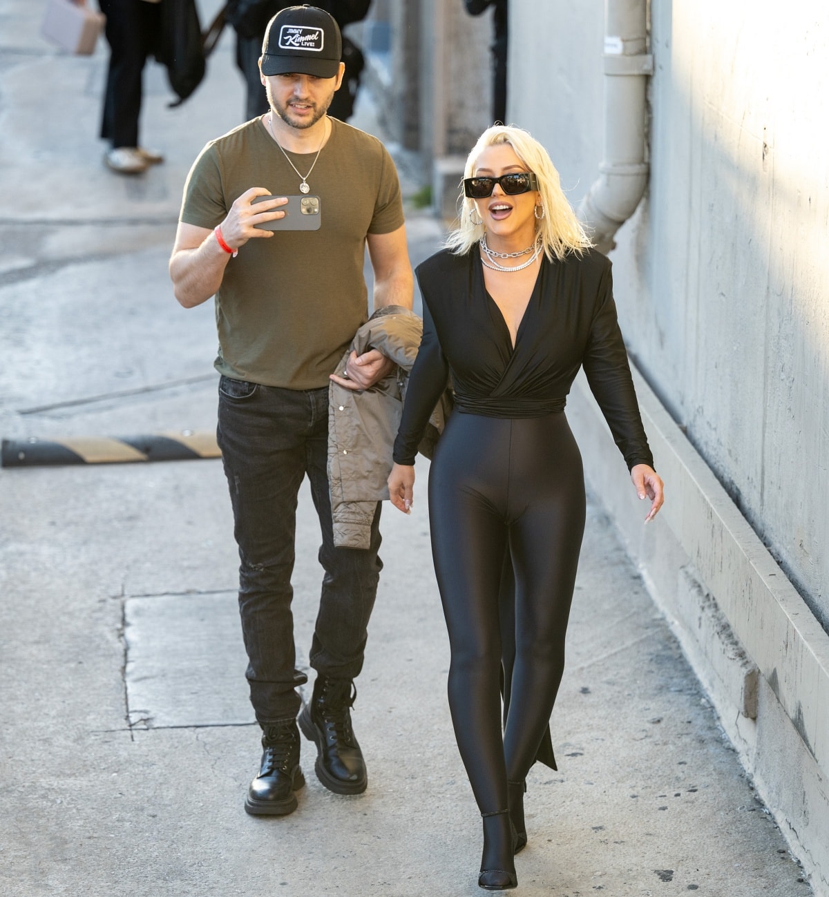 Christina Aguilera wearing Saint Laurent Opyum pumps while leaving the Jimmy Kimmel Live! studios with Matthew Rutler