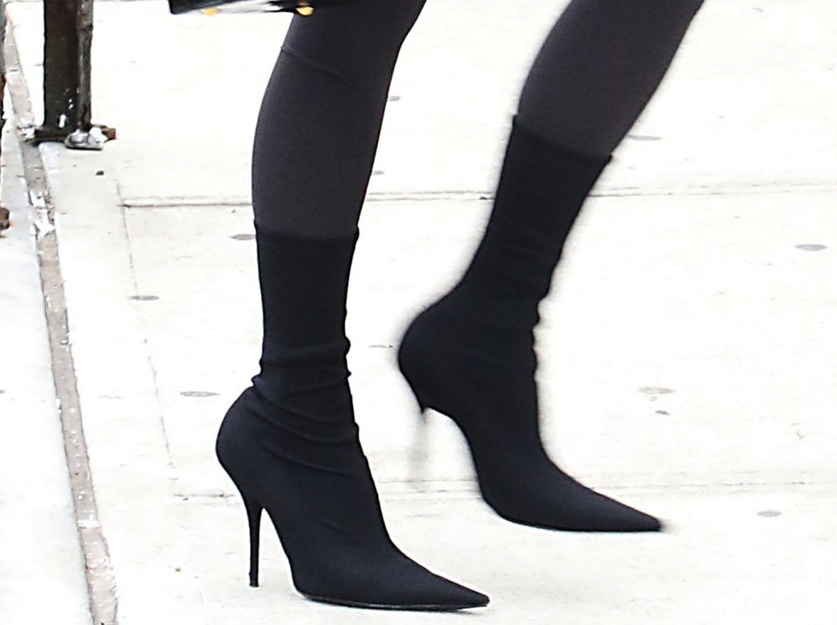 A closer look at Kim Kardashian’s pointed-toe Balenciaga black velvet heeled boots