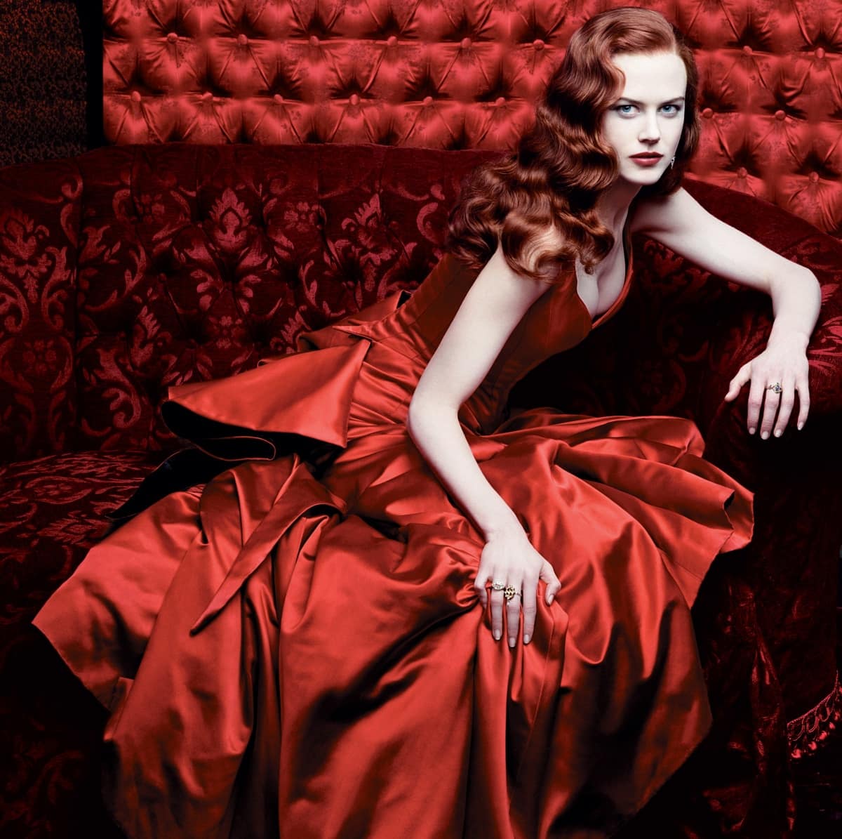 Nicole Kidman showcases her lush, curly red locks that have made her a style icon, seen here in her vibrant film roles