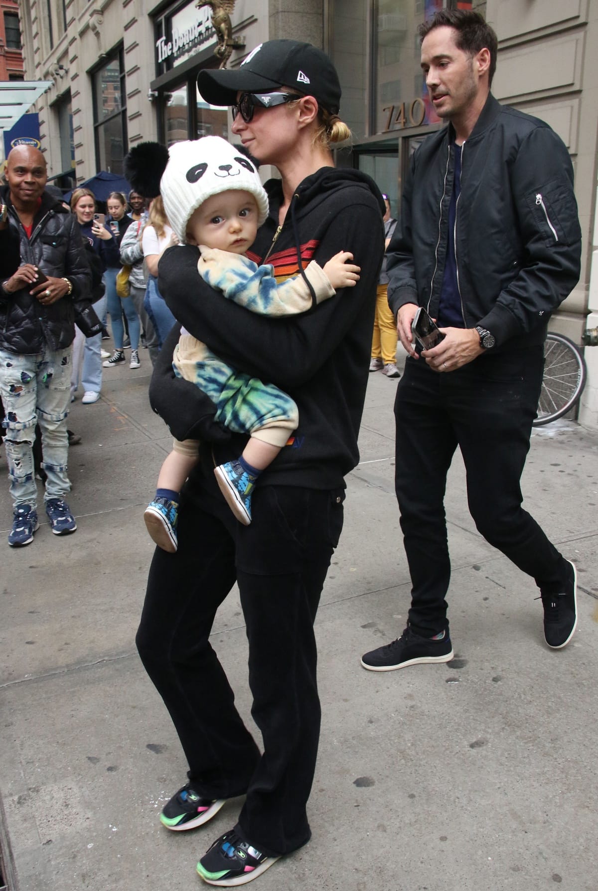 Paris Hilton, with son Phoenix Barron Hilton Reum and husband Carter Reum, spotted leaving their penthouse apartment in New York City