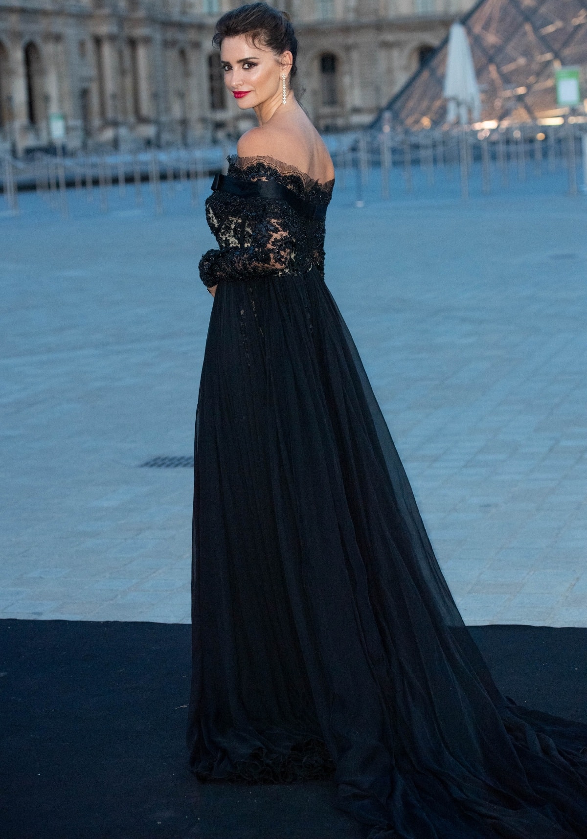 Penélope Cruz’s jumpsuit featured a sheer black fabric attached at the waist, making for a dramatic train