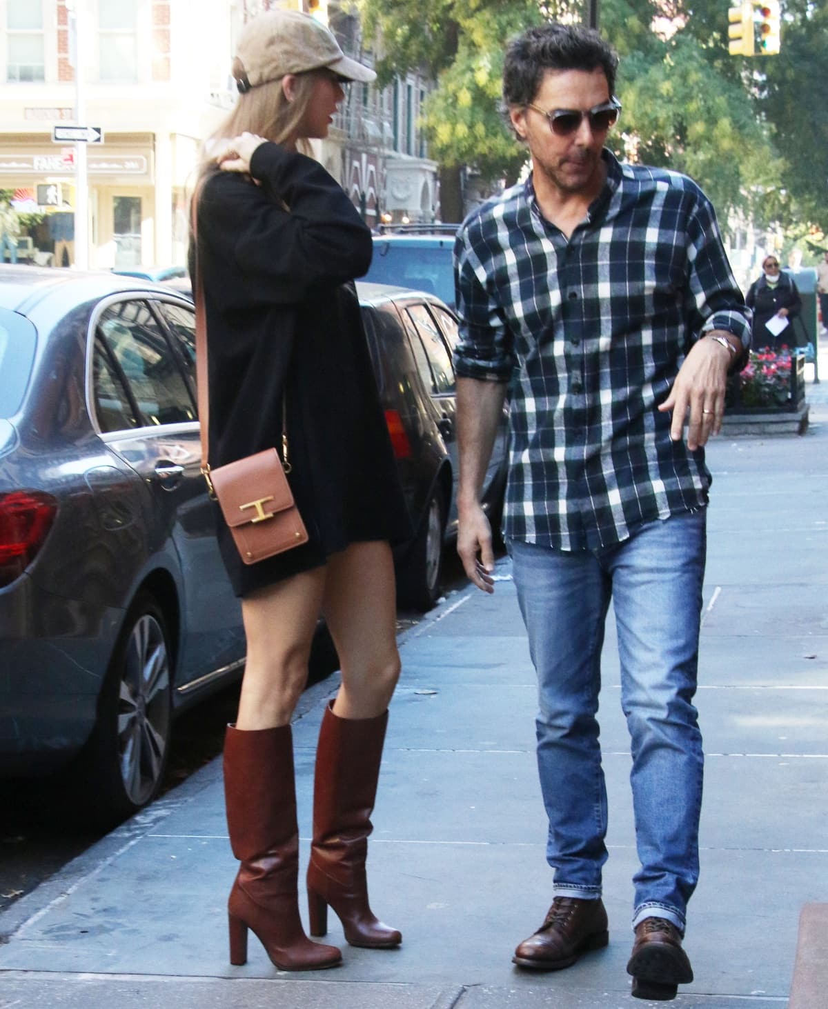 Taylor Swift spotted with director Shawn Levy out in New York City on October 26, 2023, sparking rumors of a cameo in Deadpool 3
