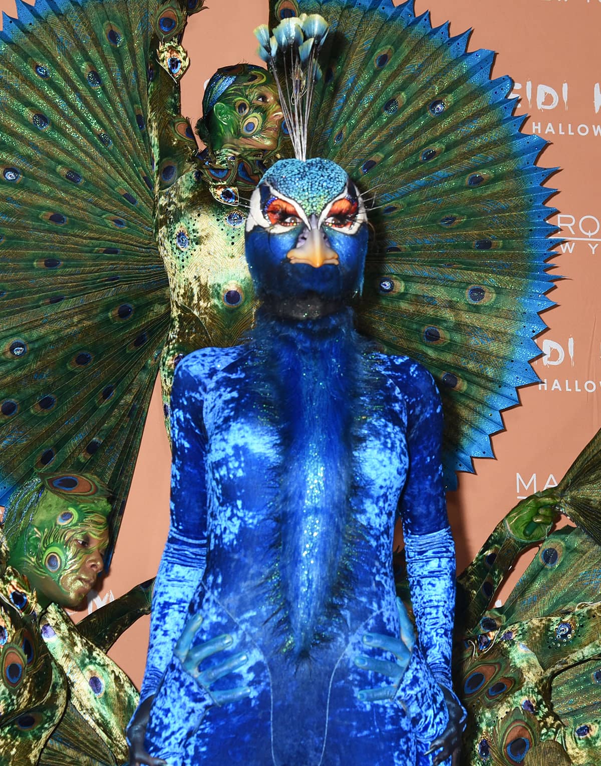 Heidi Klum commissioned Bill Corso to create her intricate peacock headpiece and beak