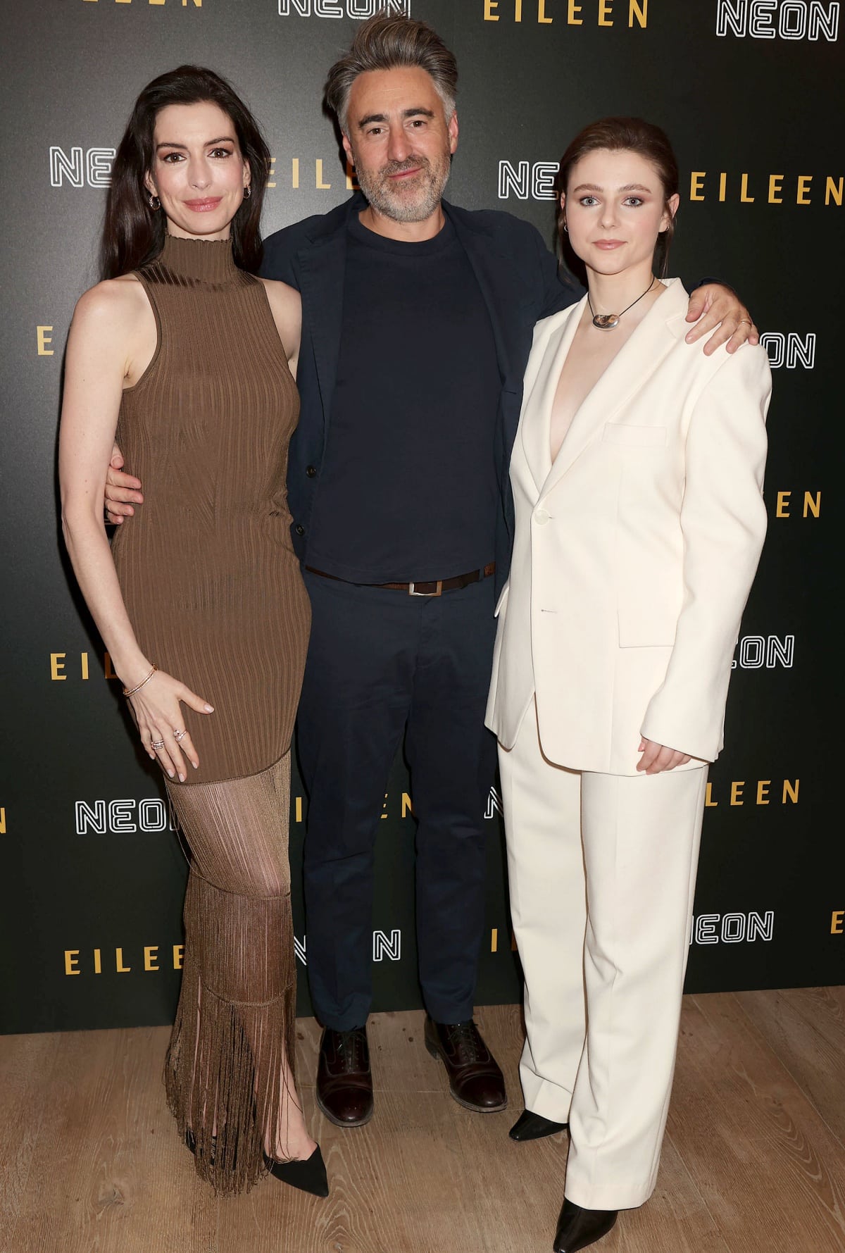 Anne Hathaway and Thomasin McKenzie with director William Oldroyd at the New York special screening of Eileen