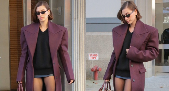 Hailey Bieber Slays Model Off-Duty Aesthetic in Micro Mini Skirt and Bold Burgundy The Attico Coat
