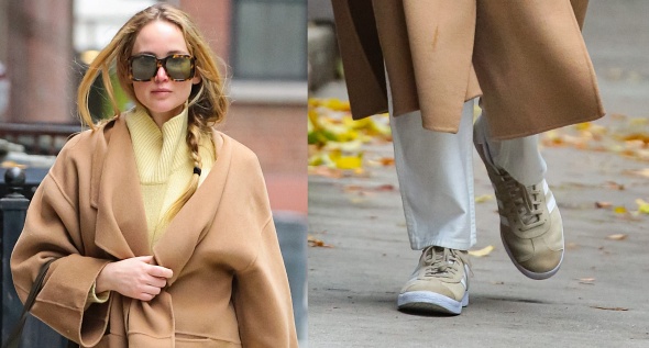 Jennifer Lawrence Radiates Effortless Elegance in Cream Tory Burch Turtleneck Sweater and Caramel Totême Trench Coat During NYC Stroll