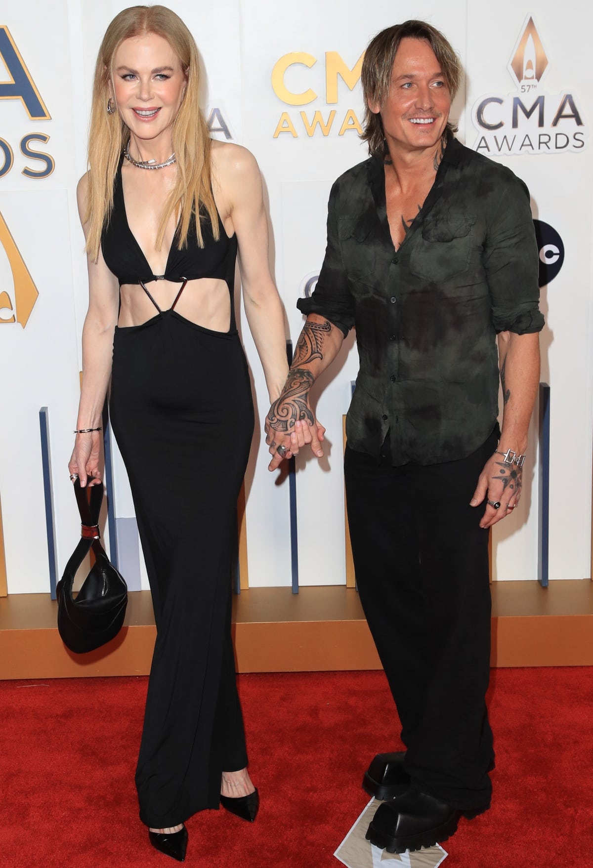 Nicole Kidman and Keith Urban were in good spirits as they held hands and posed for photographs on the red carpet