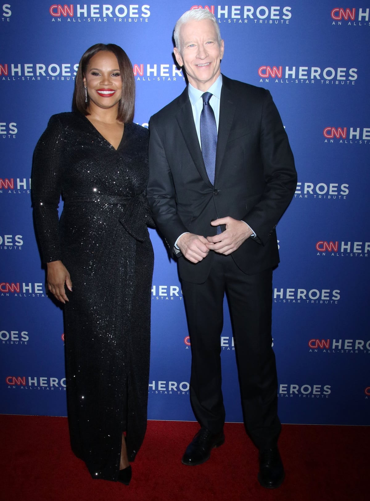 Anderson Cooper and Laura Coates, the dynamic duo, lighting up the stage as they host the CNN Heroes: An All-Star Tribute at The American Museum of Natural History on December 10, 2023 in New York City