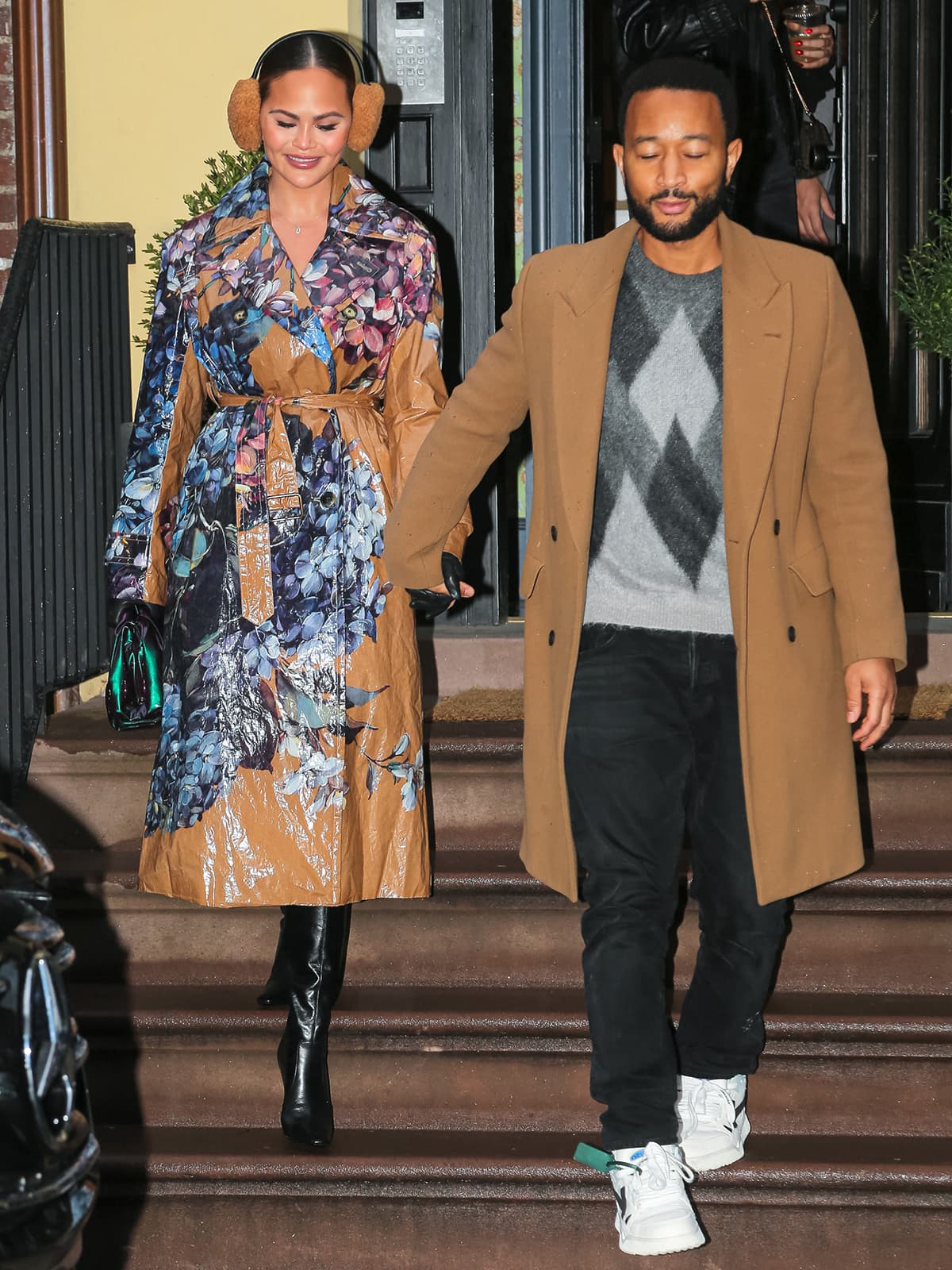 Chrissy Teigen and John Legend run errands in New York City before heading to 30 Rockefeller Plaza with daughter Luna on December 27, 2023