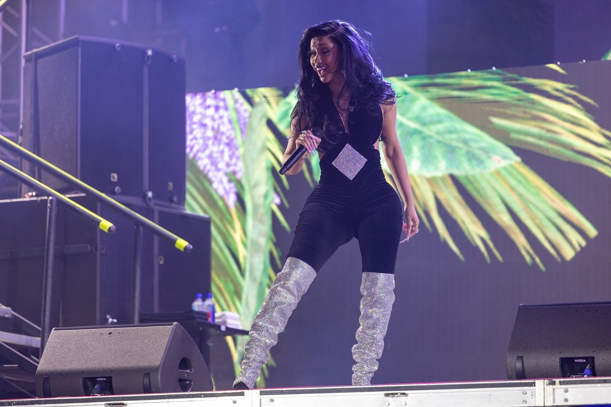 Cardi B, the queen of beauty and glam, taking the stage at Fontainebleau Miami Beach, shining bright in her dazzling ensemble as she welcomes 2024 with unmatched charisma on December 31, 2023