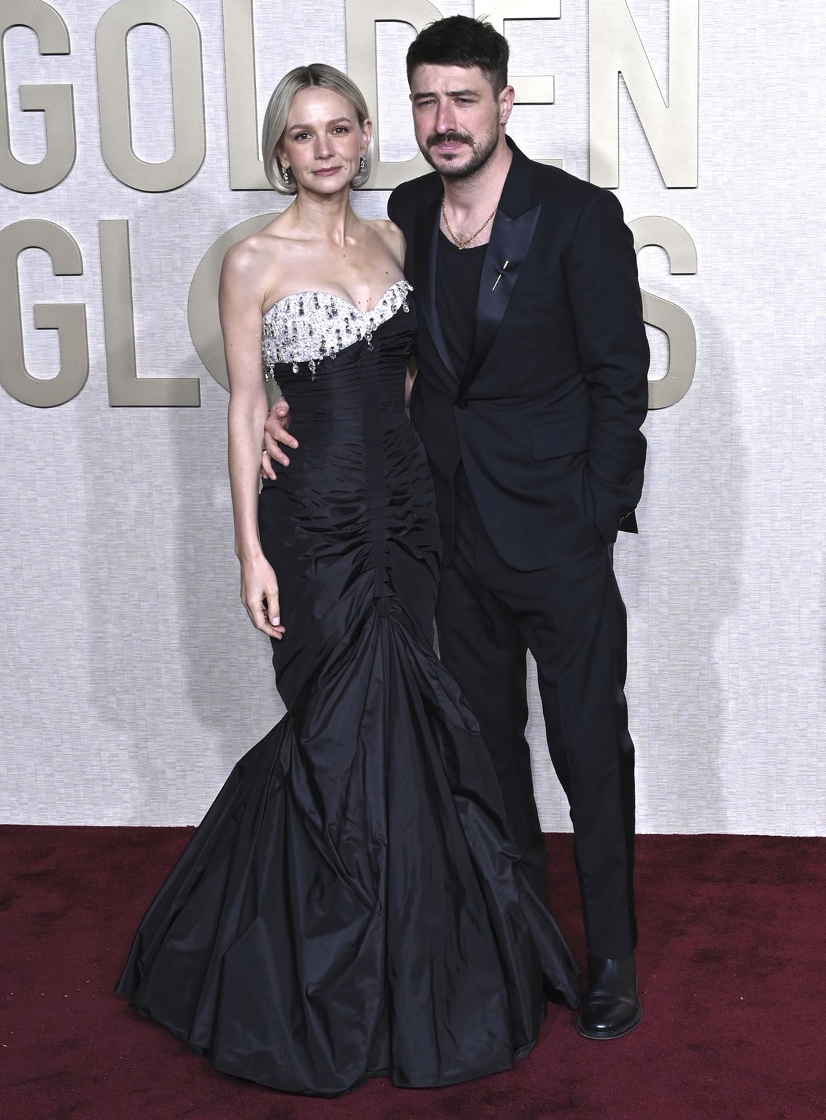 Carey Mulligan and Marcus Mumford, a vision of charisma and style, grace the Golden Globes red carpet together