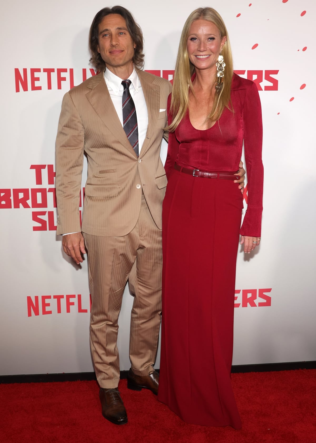 Gwyneth Paltrow and Brad Falchuk, a dazzling couple, grace the red carpet at the Netflix Tudum Theater in Los Angeles for the premiere of "The Brothers Sun" on January 4, 2024