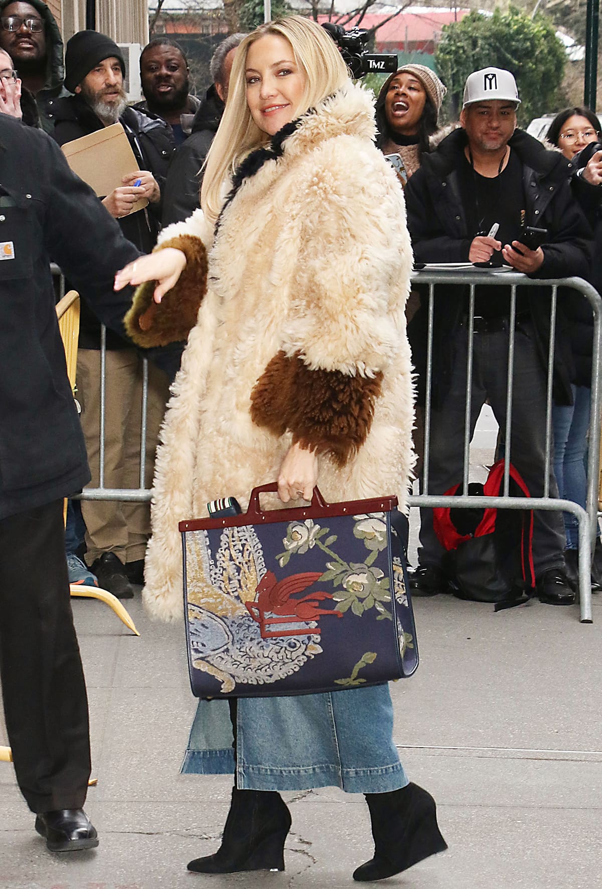 Kate Hudson carries her day's essentials in the Etro jacquard Pegaso motif structured tote bag