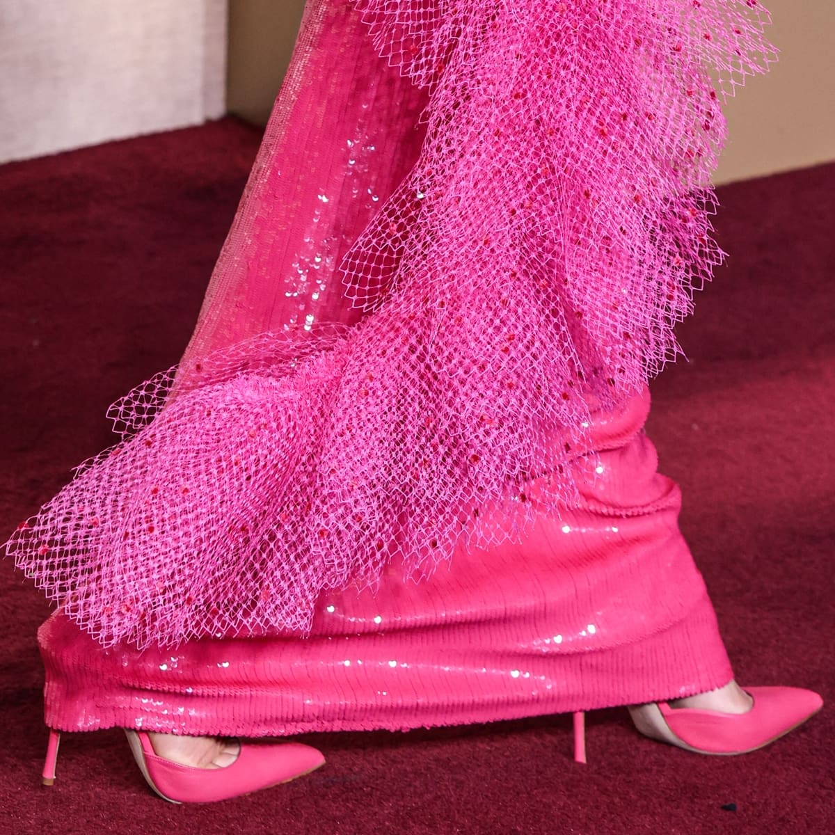 Classic Barbie glamour meets high fashion as Margot Robbie accessorizes with custom Manolo Blahnik hot pink pumps