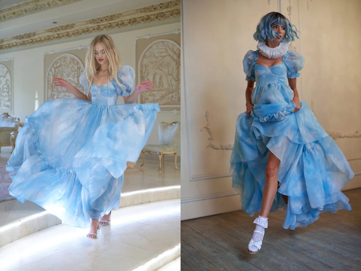 Models showcase Selkie’s ethereal “Head in the Clouds” Ritz Gown, styled with sparkling sandals and lace-trimmed platforms that highlight the dress’s romantic, cloud-printed organza