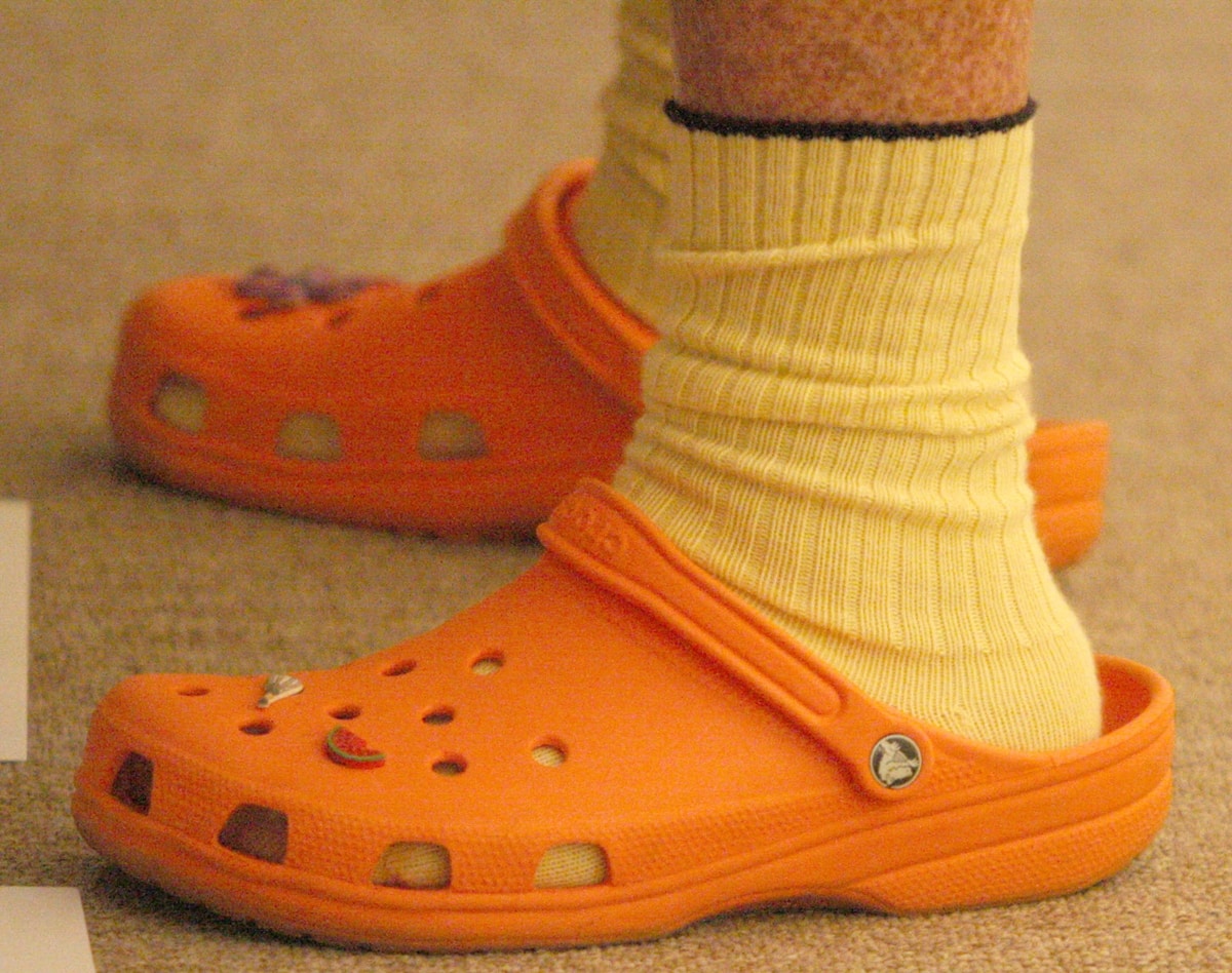 Crocs stands out for its clog-style comfort and unique designs, blending functionality with a distinctive look that has captured a global audience