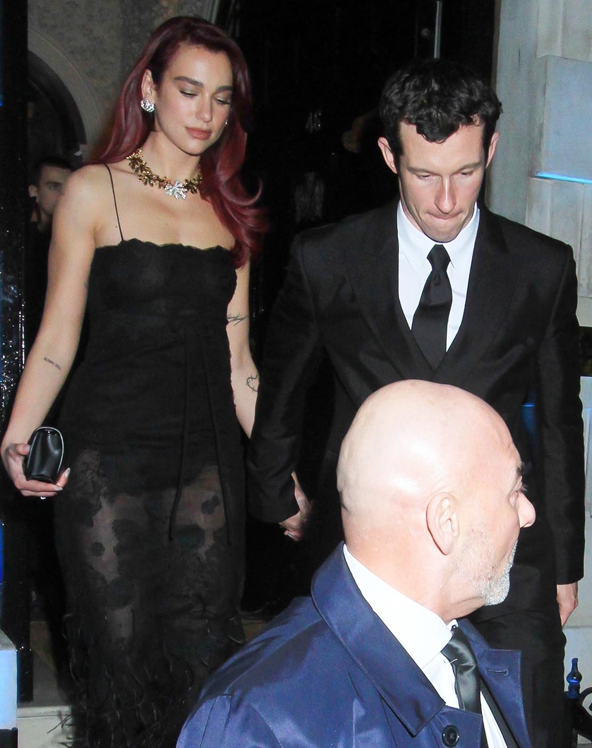 For the British Vogue And Tiffany & Co.’s annual Fashion and Film party at Annabel's nightclub, Dua Lipa chose a sheer black Valentino floral lace gown from the Pre-Fall 2024 couture collection
