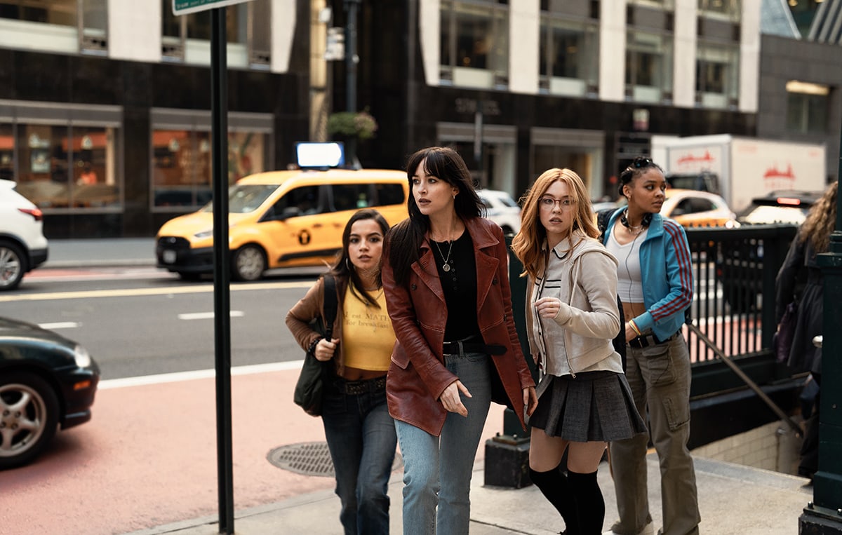 Dakota Johnson with Spider-Women Isabela Merced, Sydney Sweeney, and Celeste O'Connor on the set of Madame Web