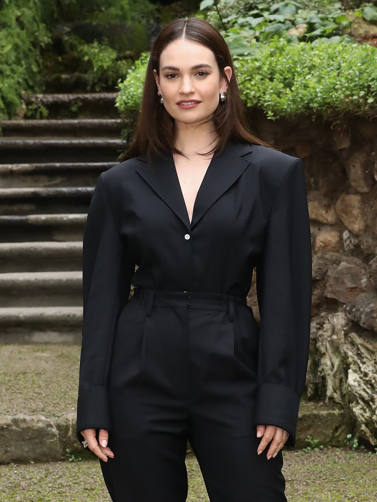 Lily James keeps her jewelry simple and enhances her lovely facial features with minimal makeup
