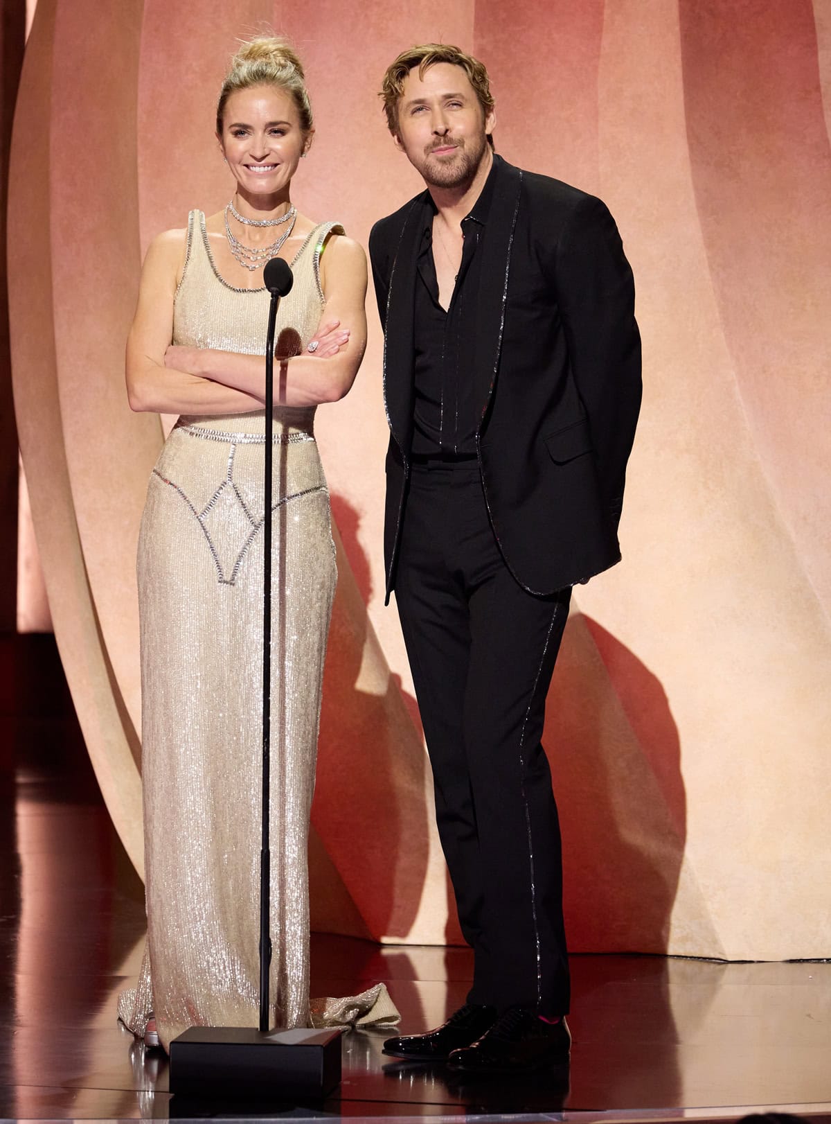 Emily Blunt stuns in a shimmering custom Schiaparelli gown while presenting with Ryan Gosling during the 96th Oscars ceremony, honoring stunt performers at the Dolby® Theatre on March 10, 2024