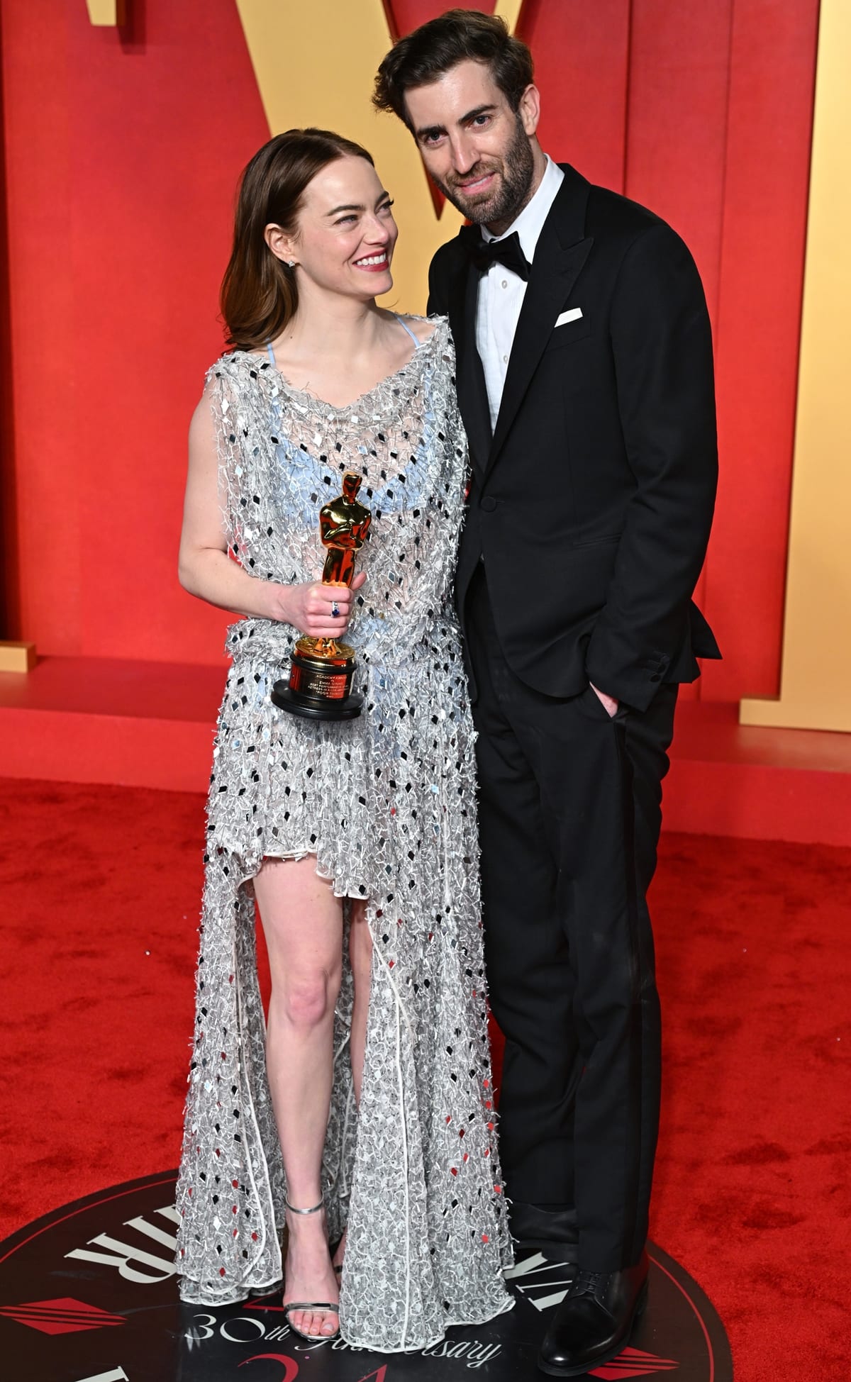Emma Stone and her husband, Dave McCary, attended the 2024 Vanity Fair Oscar Party together, celebrating her achievements and sharing their joy
