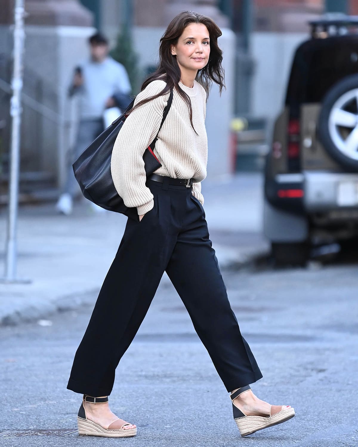 Katie Holmes steps out in New York City on the first day of spring in neutral outfit with espadrille wedge heels on March 19, 2024