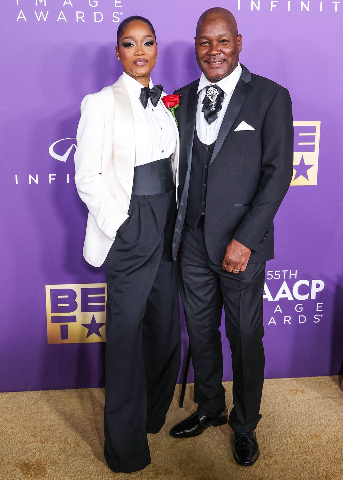 Keke Palmer is joined on the NAACP Image Awards red carpet by her father Larry Palmer who looks dapper in a three-piece suit