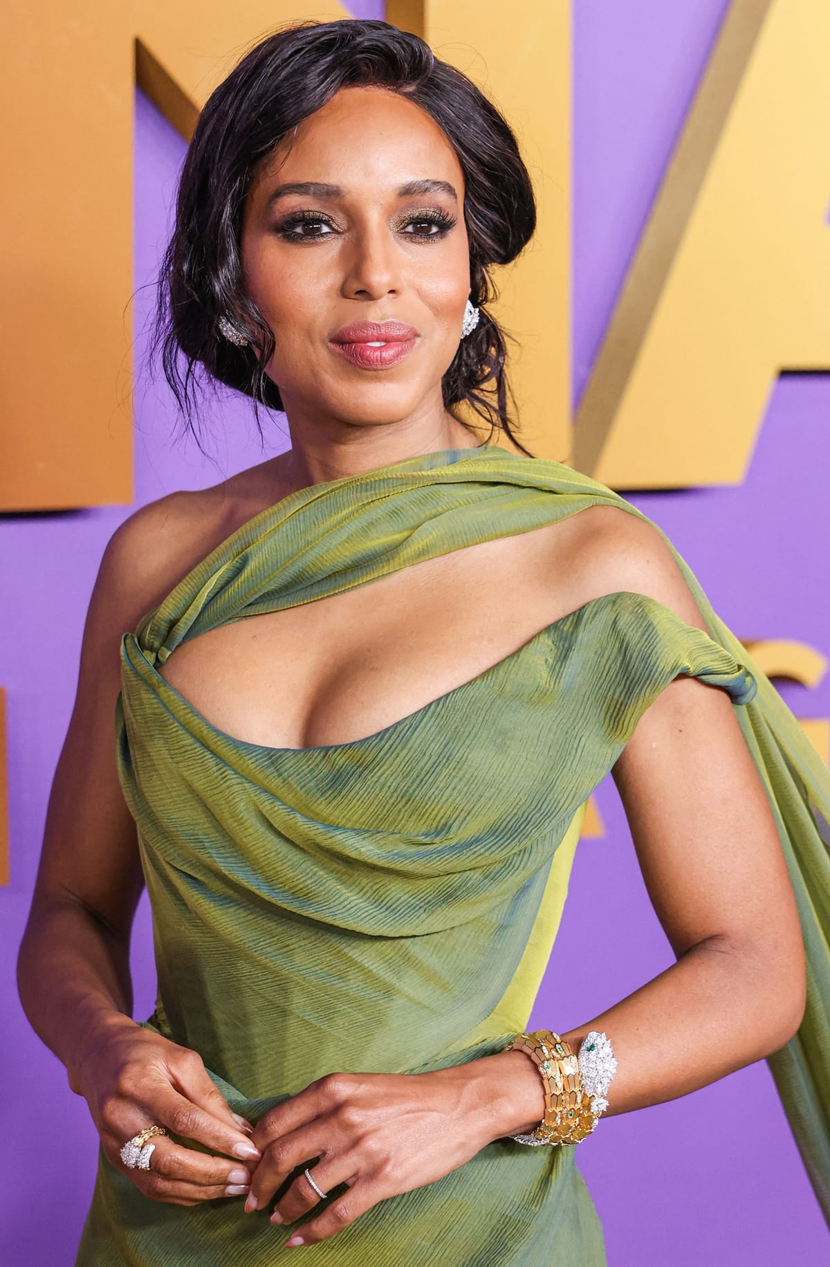Kerry Washington is adorned in Bulgari jewels, the perfect complement to her green goddess ensemble