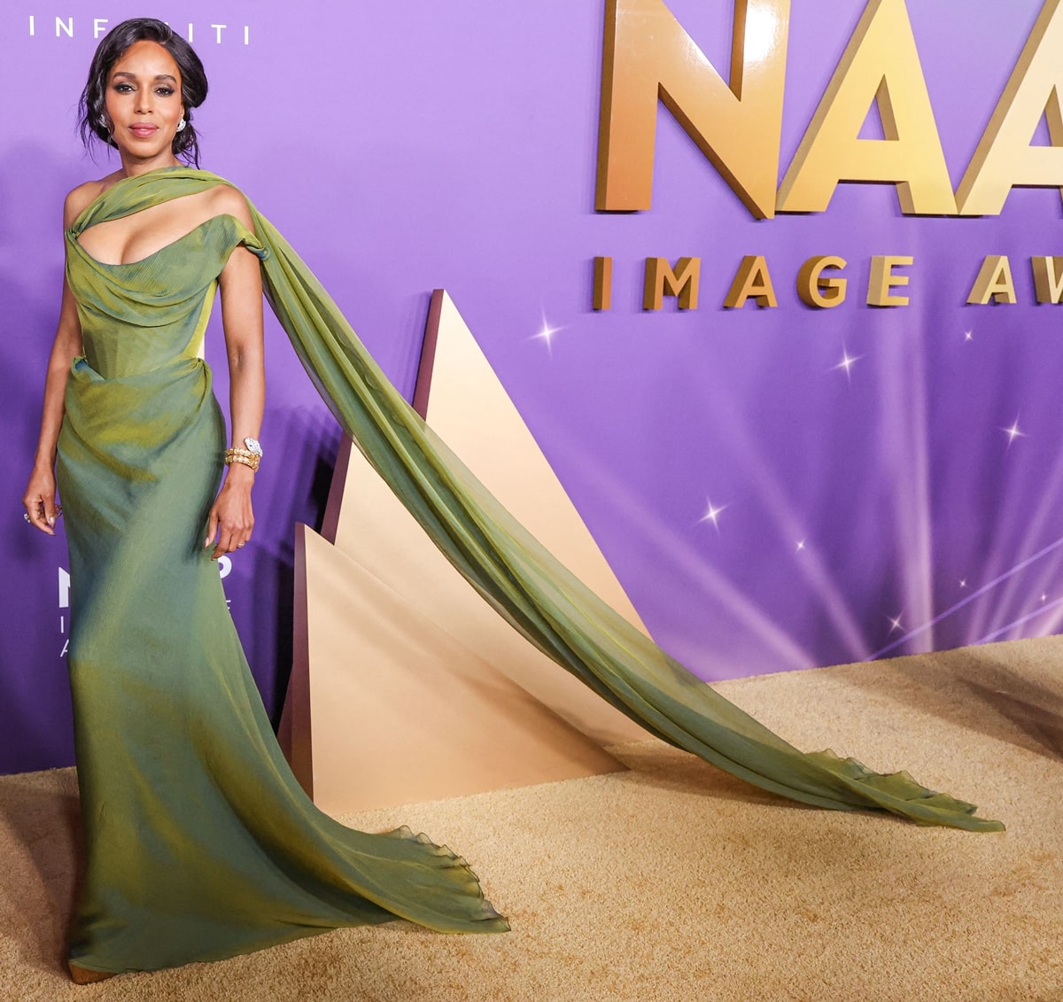 Kerry Washington dazzled in a radiant green gown at the 2024 NAACP Image Awards, embodying the epitome of grace and style