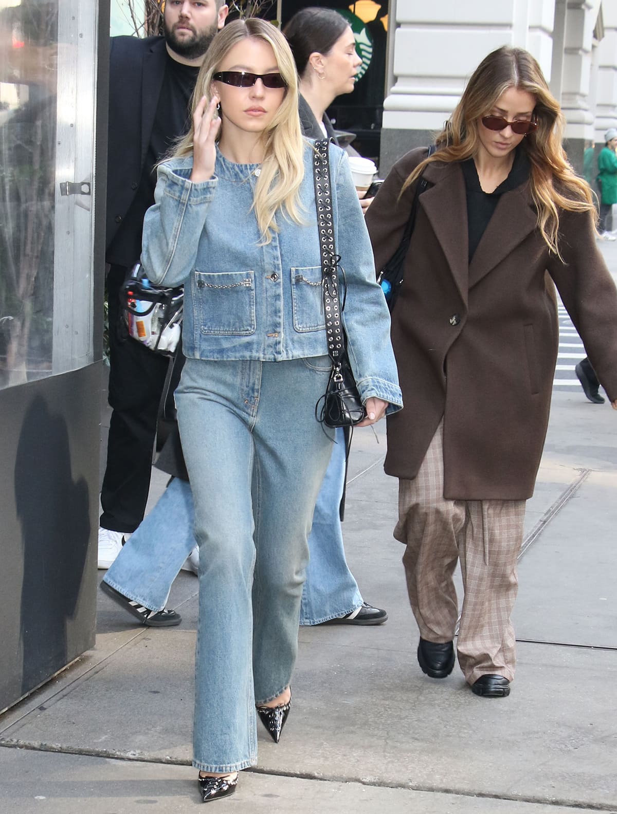 Sydney Sweeney embraces the Canadian Tuxedo trend in a Givenchy collarless jean jacket and bootleg jeans on February 27, 2024