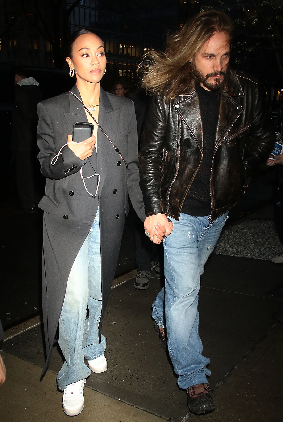 Zoe Saldaña and Marco Perego head to The View in cool, casual outfits to discuss The Absence of Eden on March 28, 2024