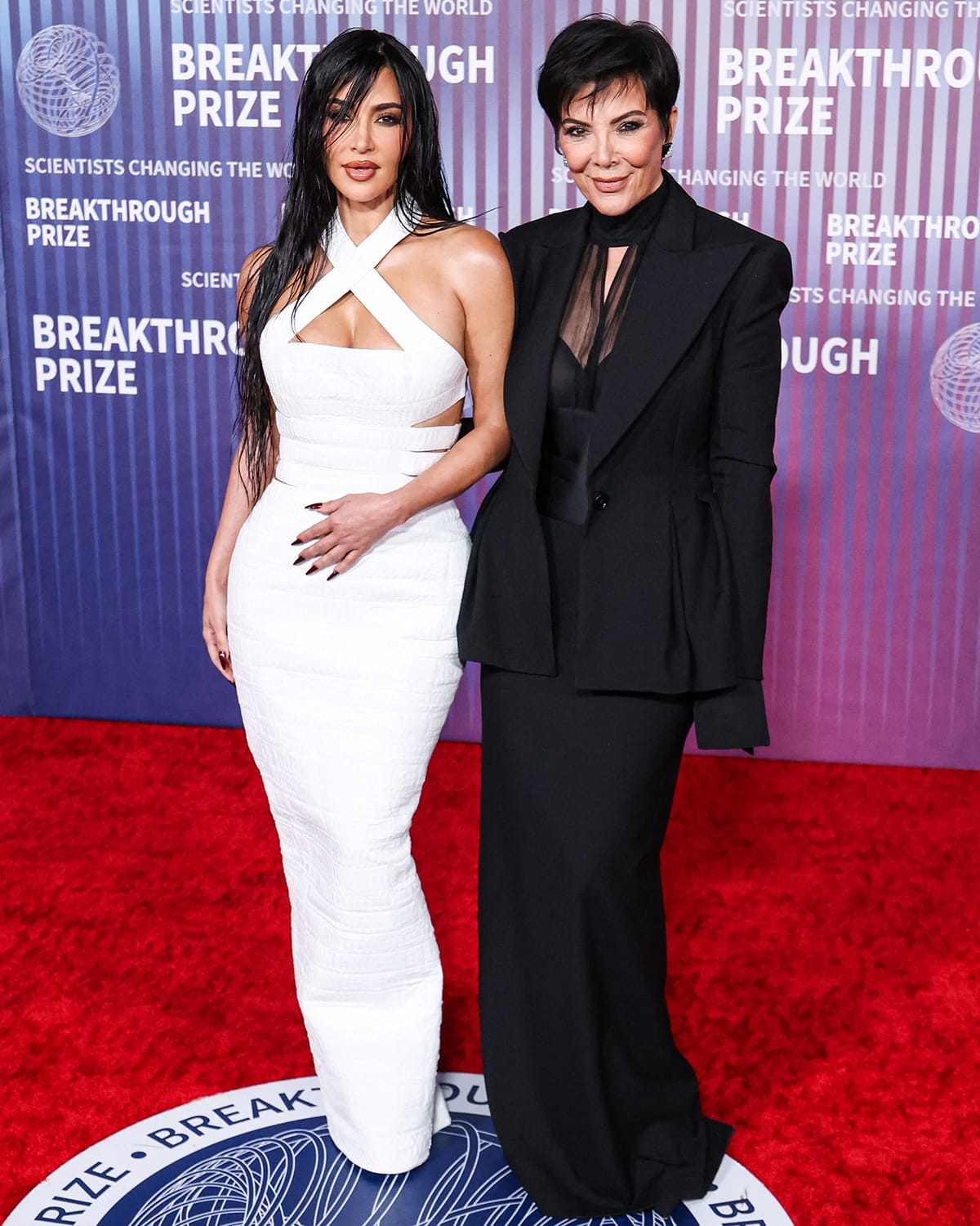 Kim Kardashian and Kris Jenner are yin and yang in black and white gowns at the 10th Annual Breakthrough Prize Ceremony held at the Academy Museum of Motion Pictures on April 13, 2024