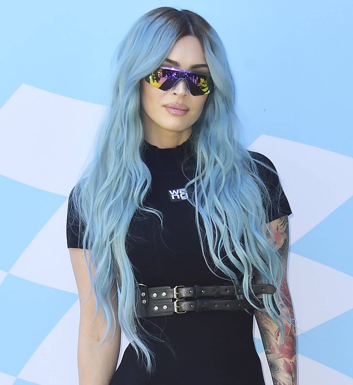 Megan Fox wears 26-inch acrylic blue extensions with her blue bob for the Coachella 2024