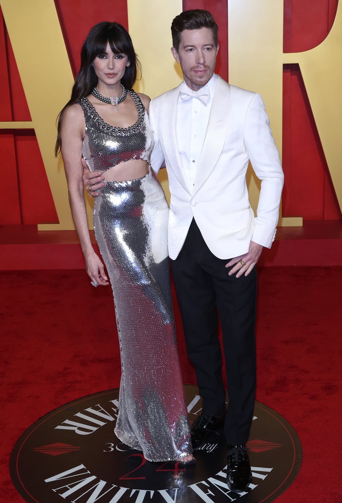 Nina Dobrev and Shaun White dazzled on the red carpet at the 96th Academy Awards Vanity Fair Party, hosted at the Wallis Annenberg Center for the Performing Arts