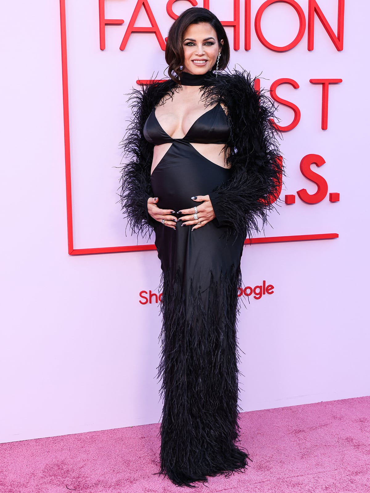 Jenna Dewan flaunts her growing baby bump in a black feather dress by Cult Gaia at the 2024 Fashion Trust US Awards in Beverly Hills on April 9, 2024