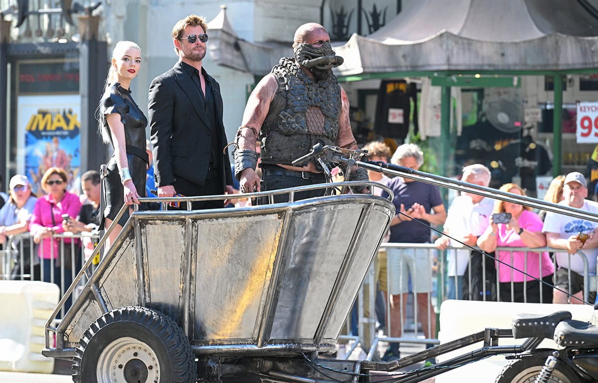 Anya Taylor-Joy and Chris Hemsworth ride a chariot on Hollywood Boulevard before their appearance on Jimmy Kimmel Live! to talk about their upcoming movie Furiosa: A Mad Max Saga